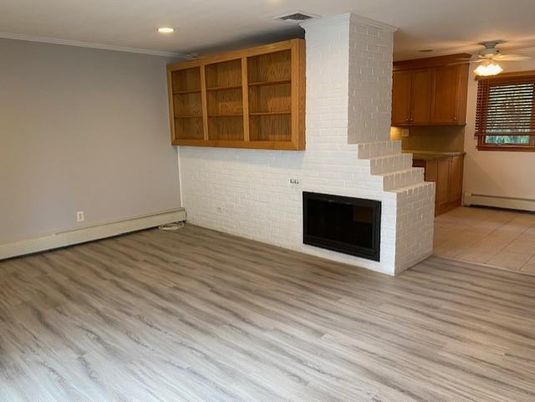 Empty room, Fireplace, Interior, Recessed Lighting, Wood Texture Flooring