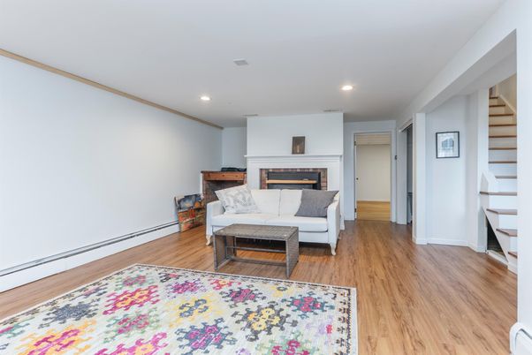 Fireplace, Interior, Living room, Recessed Lighting, Wood Texture Flooring