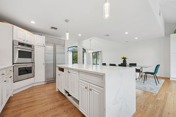 Dining room, Interior, Kitchen, Pendant Lights, Recessed Lighting, Stainless Steel Appliances, Wood Texture Flooring