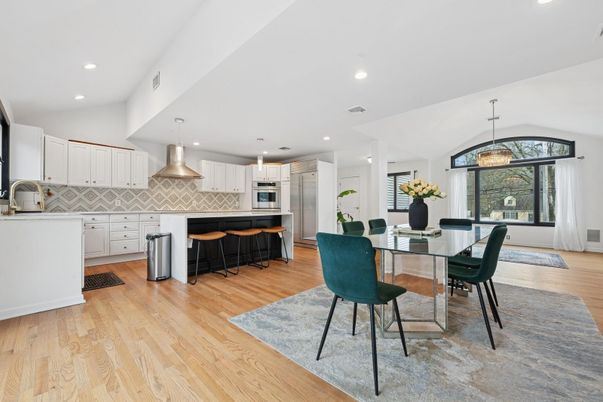 Dining room, Interior, Kitchen, Pendant Lights, Recessed Lighting, Stainless Steel Appliances, Wood Texture Flooring