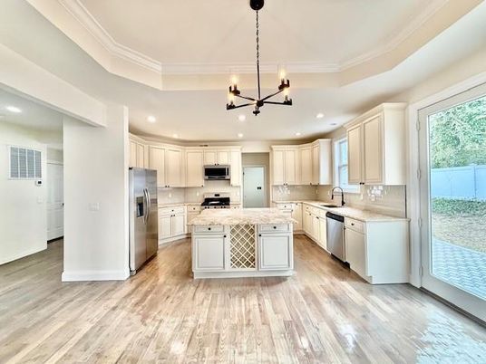 Chandelier, Interior, Kitchen, Pendant Lights, Recessed Lighting, Stainless Steel Appliances, Wood Texture Flooring