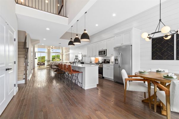 Dining room, Interior, Kitchen, Pendant Lights, Recessed Lighting, Stainless Steel Appliances, Wood Texture Flooring