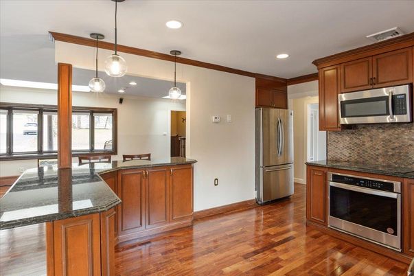 Interior, Kitchen, Pendant Lights, Recessed Lighting, Stainless Steel Appliances, Wood Texture Flooring