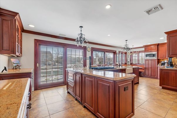 Chandelier, Dining room, Interior, Kitchen, Pendant Lights, Recessed Lighting, Stainless Steel Appliances
