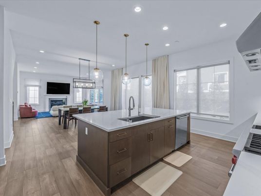 Dining room, Fireplace, Interior, Kitchen, Living room, Pendant Lights, Recessed Lighting, Stainless Steel Appliances, Wood Texture Flooring