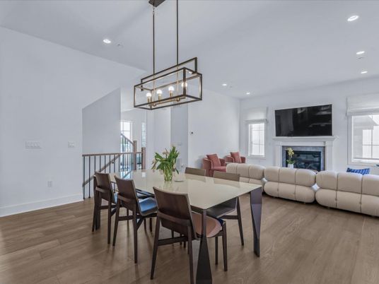 Dining room, Fireplace, Interior, Living room, Pendant Lights, Recessed Lighting, Wood Texture Flooring