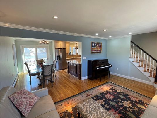 Dining room, Interior, Kitchen, Living room, Piano, Recessed Lighting, Stainless Steel Appliances, Wood Texture Flooring
