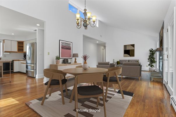 Chandelier, Dining room, Interior, Kitchen, Living room, Recessed Lighting, Stainless Steel Appliances, Wood Texture Flooring