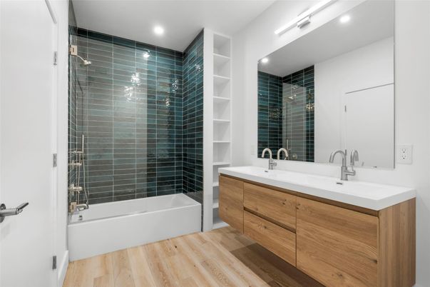 Bathroom, Dual Sink Vanities, Glass Shower, Interior, Recessed Lighting, Wood Texture Flooring