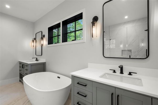 Bathroom, Dual Sink Vanities, Free Standing Baths, Interior, Marble Walls, Recessed Lighting, Wood Texture Flooring