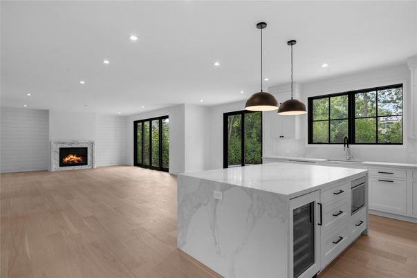 Empty room, Fireplace, Interior, Kitchen, Pendant Lights, Recessed Lighting, Wood Texture Flooring