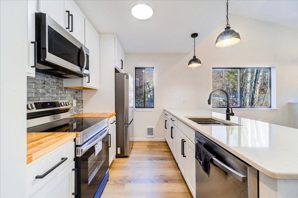 Interior, Kitchen, Pendant Lights, Stainless Steel Appliances, Wood Texture Flooring