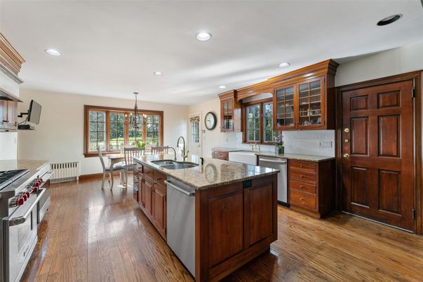 Chandelier, Dining room, Interior, Kitchen, Recessed Lighting, Stainless Steel Appliances, Wood Texture Flooring