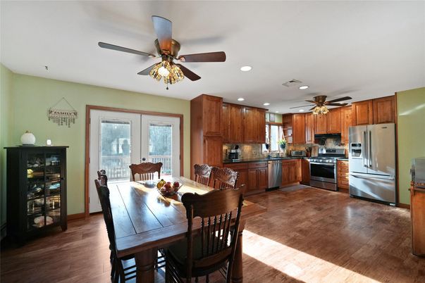 Dining room, Interior, Kitchen, Recessed Lighting, Stainless Steel Appliances, Wood Texture Flooring