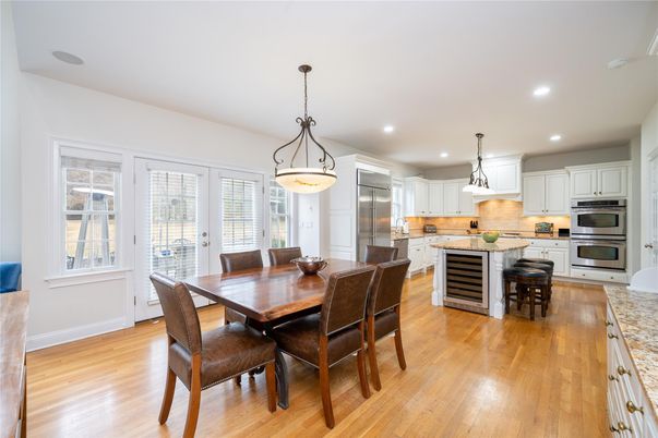 Dining room, Interior, Kitchen, Pendant Lights, Recessed Lighting, Stainless Steel Appliances, Wood Texture Flooring