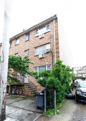 Exterior, Facade, Brick Facade, Condo Building