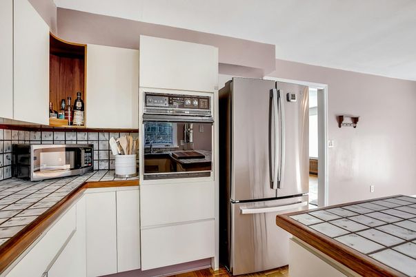 Interior, Kitchen, Tile Countertops, Wood Texture Flooring
