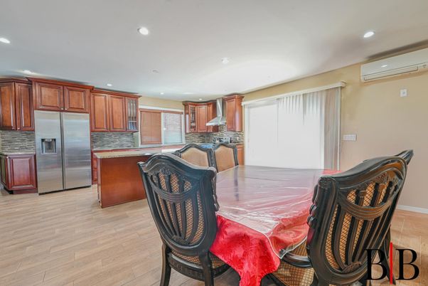 Dining room, Interior, Kitchen, Recessed Lighting, Stainless Steel Appliances, Wood Texture Flooring