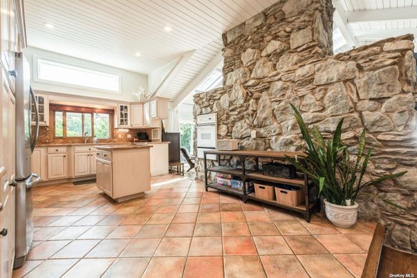 Fireplace, Interior, Kitchen, Recessed Lighting, Stainless Steel Appliances, Stone Walls