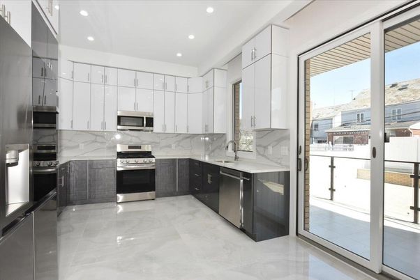 Interior, Kitchen, Marble Walls, Recessed Lighting, Stainless Steel Appliances