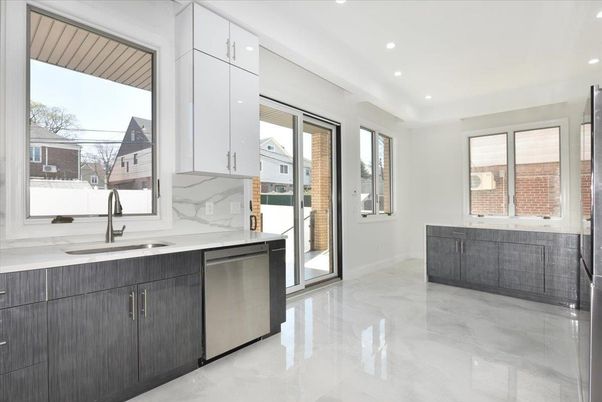 Interior, Kitchen, Marble Walls, Recessed Lighting, Stainless Steel Appliances