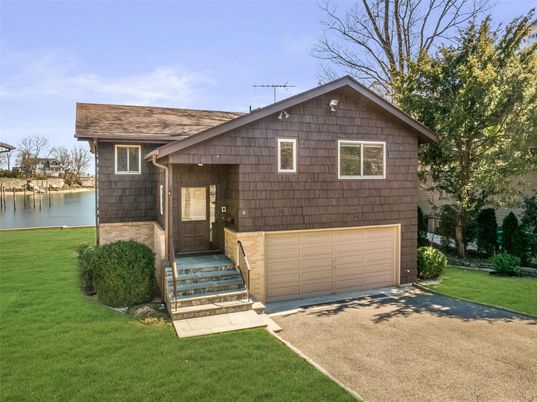 Attached, Exterior, Facade, Water, Raised Ranch