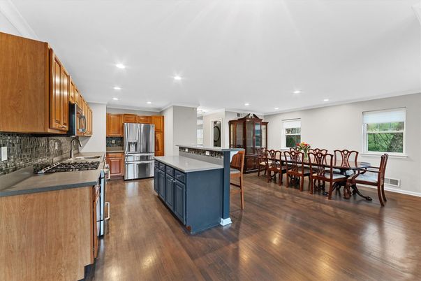 Dining room, Interior, Kitchen, Recessed Lighting, Stainless Steel Appliances, Wood Texture Flooring