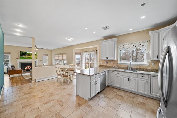 Dining room, Fireplace, Interior, Kitchen, Living room, Recessed Lighting, Stainless Steel Appliances