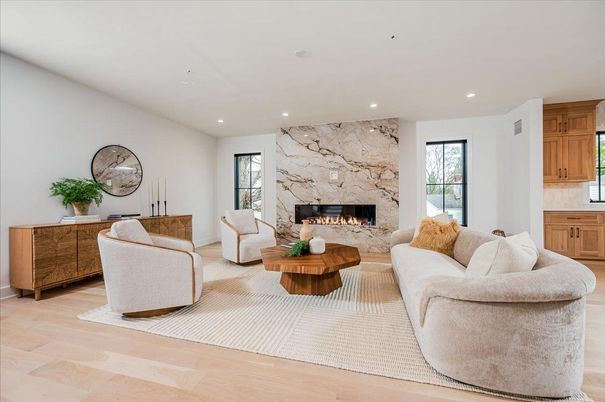Fireplace, Interior, Living room, Marble Walls, Recessed Lighting, Wood Texture Flooring