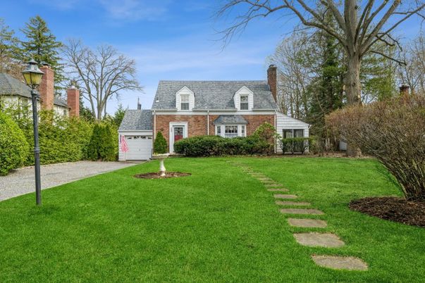 Attached, Backyard, Exterior, Facade, Brick Facade, Cape Cod