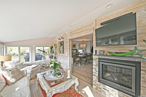 Dining room, Fireplace, Interior, Living room, Pendant Lights, Piano, Recessed Lighting, Stone Walls, Wood Texture Flooring