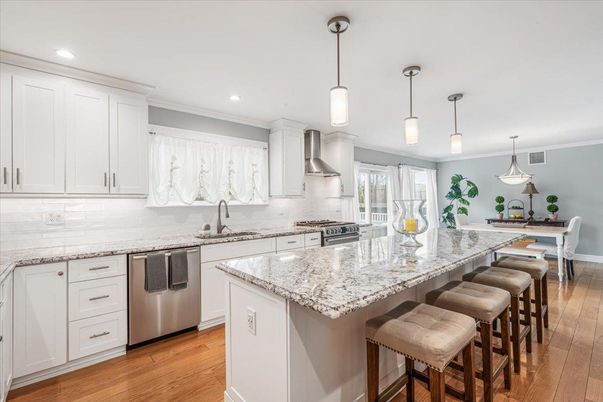 Dining room, Interior, Kitchen, Pendant Lights, Recessed Lighting, Stainless Steel Appliances, Wood Texture Flooring
