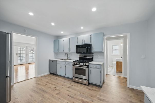 Interior, Kitchen, Recessed Lighting, Stainless Steel Appliances, Wood Texture Flooring