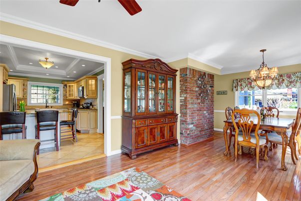Chandelier, Dining room, Interior, Kitchen, Recessed Lighting, Stone Walls, Wood Texture Flooring