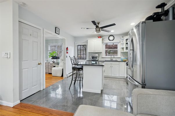 Dining room, Interior, Kitchen, Recessed Lighting, Stainless Steel Appliances, Wood Texture Flooring