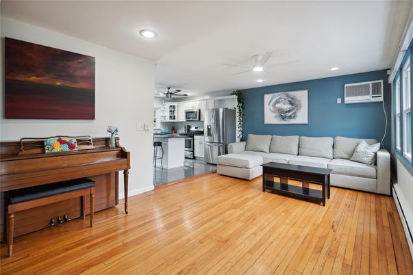 Interior, Kitchen, Living room, Piano, Recessed Lighting, Stainless Steel Appliances, Wood Texture Flooring