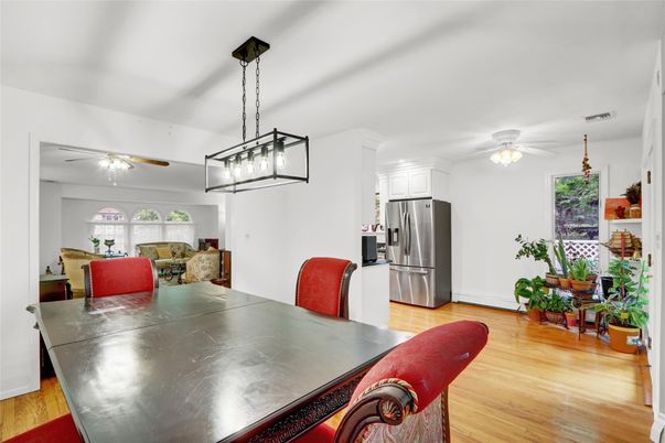 Dining room, Interior, Kitchen, Pendant Lights, Stainless Steel Appliances, Wood Texture Flooring