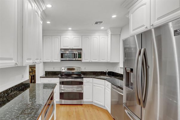 Interior, Kitchen, Recessed Lighting, Stainless Steel Appliances, Wood Texture Flooring