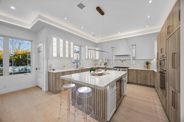 Interior, Kitchen, Marble Walls, Pendant Lights, Recessed Lighting, Stainless Steel Appliances, Wood Texture Flooring