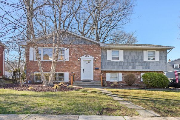 Exterior, Facade, Brick Facade, Raised Ranch