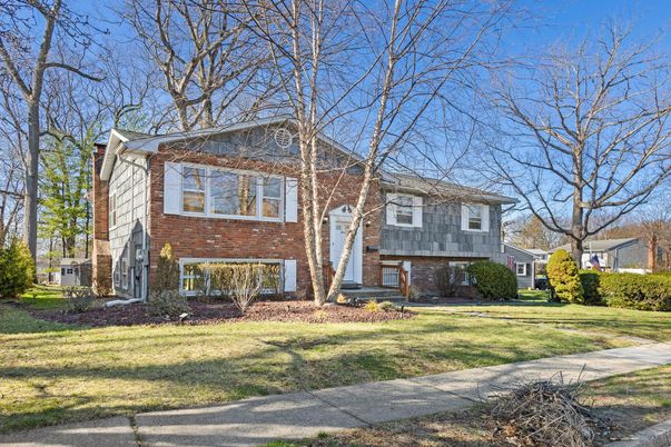 Exterior, Facade, Brick Facade, Raised Ranch