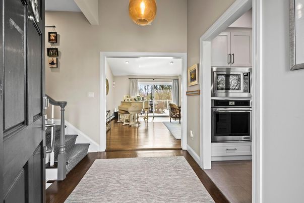 Dining room, Interior, Kitchen, Pendant Lights, Piano, Stainless Steel Appliances, Wood Texture Flooring