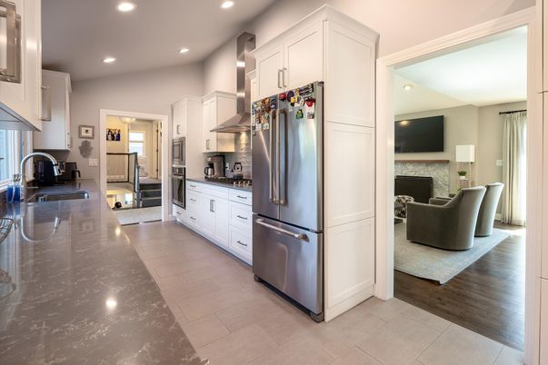 Fireplace, Interior, Kitchen, Living room, Recessed Lighting, Stainless Steel Appliances, Wood Texture Flooring