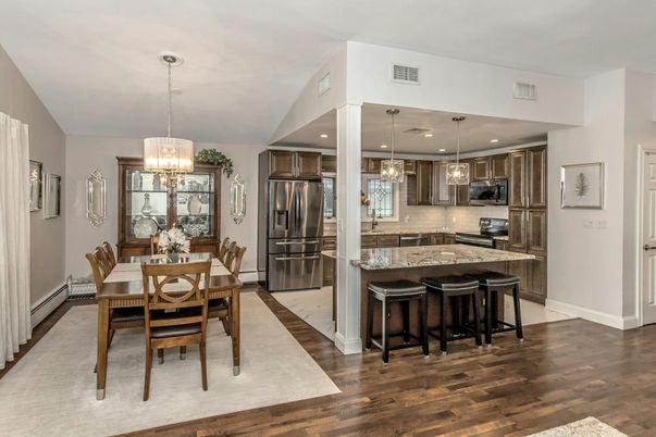 Chandelier, Dining room, Interior, Kitchen, Pendant Lights, Recessed Lighting, Stainless Steel Appliances, Wood Texture Flooring