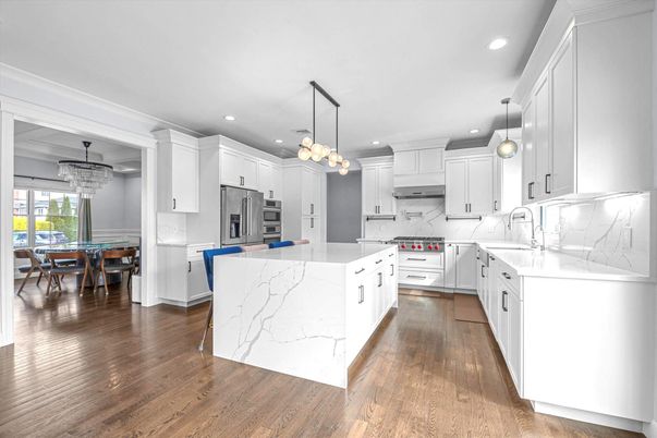 Chandelier, Dining room, Interior, Kitchen, Pendant Lights, Recessed Lighting, Stainless Steel Appliances, Wood Texture Flooring