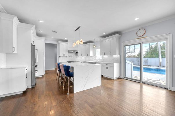 Interior, Kitchen, Marble Walls, Pendant Lights, Recessed Lighting, Wood Texture Flooring