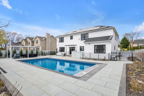 Exterior, Pool, Solar Panels