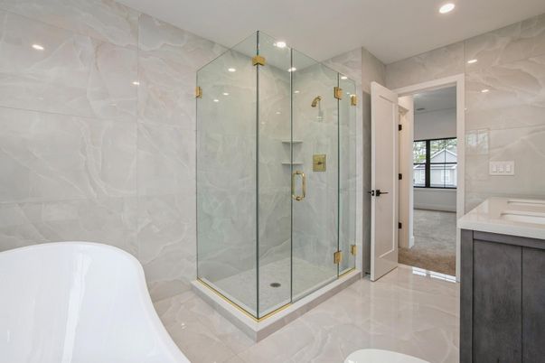 Bathroom, Free Standing Baths, Glass Shower, Interior, Marble Walls, Recessed Lighting