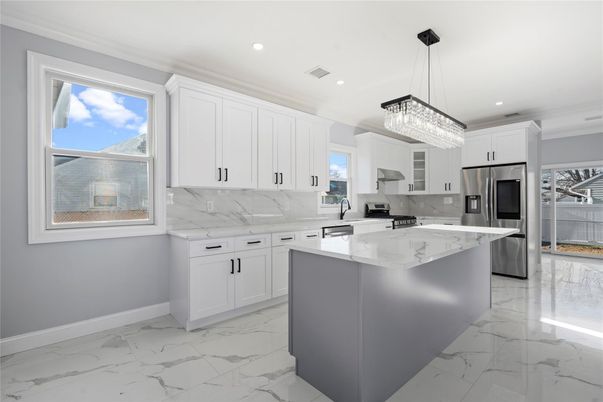 Interior, Kitchen, Marble, Marble Walls, Pendant Lights, Recessed Lighting, Stainless Steel Appliances