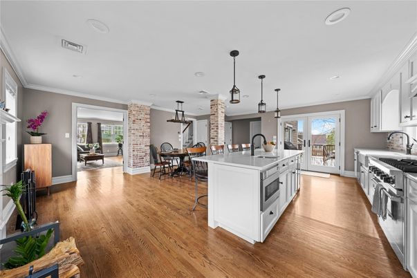 Dining room, Interior, Kitchen, Pendant Lights, Recessed Lighting, Stainless Steel Appliances, Wood Texture Flooring